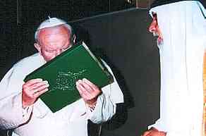 pope John Paul II with Patriarch Raphael I of Iraq, kissing the "holy qur'an"